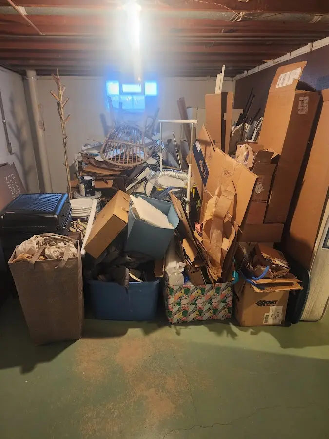 Roll-off dumpster container at job site for Concrete Dumpster Rental in Inwood